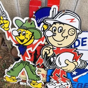 Vintage Cartoon Utility Mascot Metal Sign Pair - Yellow, Green, Red, White, Blue